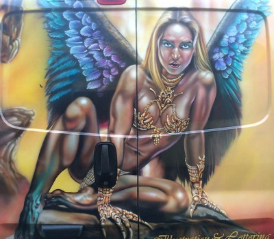 Female Figure on a Van