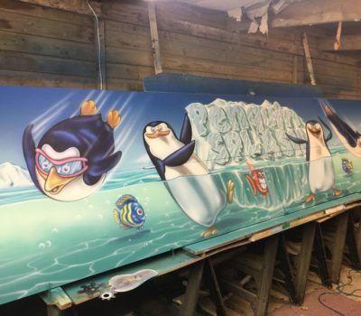 Penguin Splash with Fish